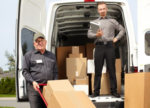 Same day removals service loading furniture and boxes in Hackney