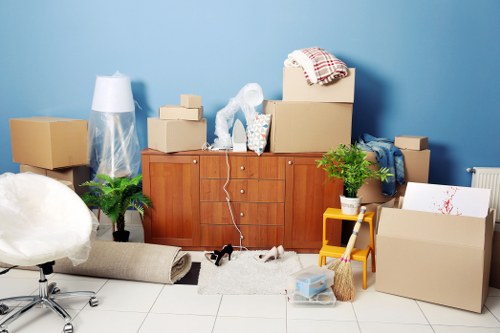 Removal van loading items from a Hackney apartment building