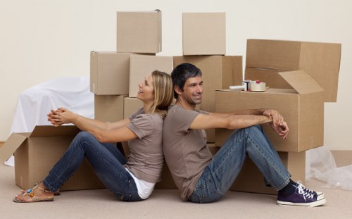 A Hackney office relocation team handling desks and workspace items
