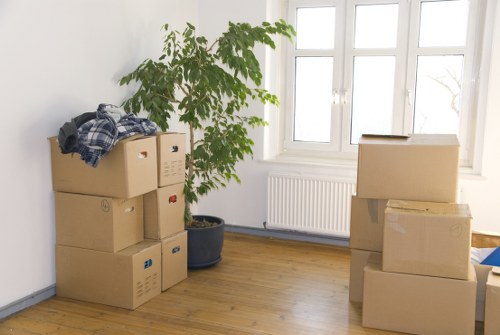 Business furniture and equipment being prepared for an office move in Hackney